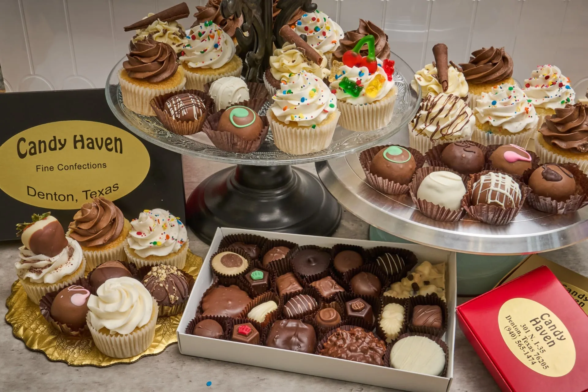 Display of cupcakes and chocolates from Candy Haven in Denton, Texas